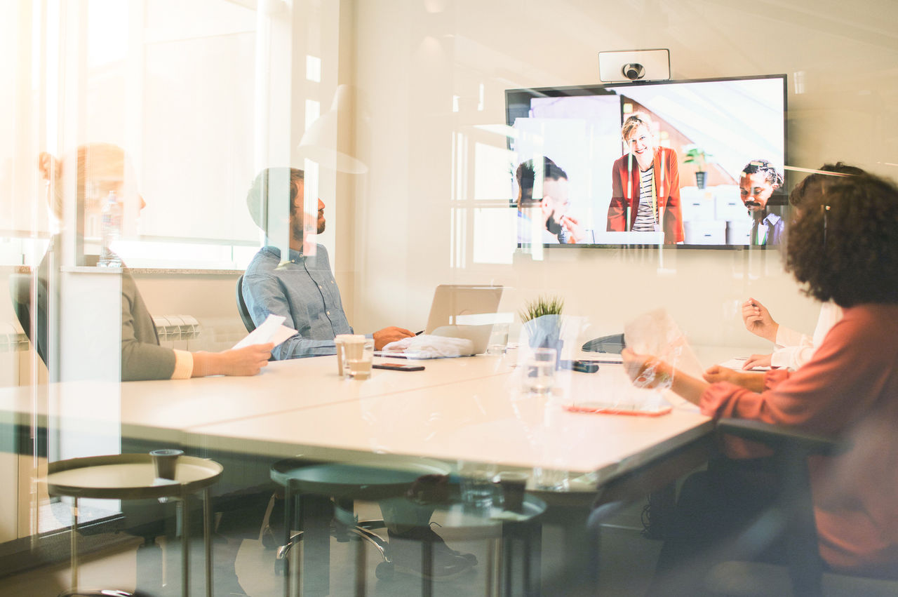 Colleagues on a video conference meeting.